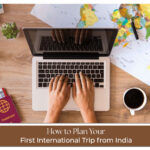 Indian traveller planning first international trip with passport, tickets, and itinerary.
