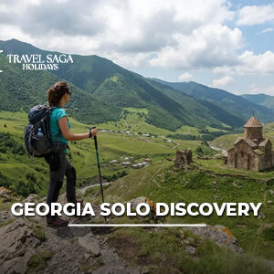 Solo traveler exploring Georgia’s scenic mountains, historic streets, and cultural attractions during a discovery tour