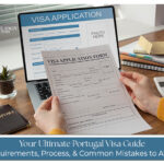 Traveler holding Portugal visa documents and passport while planning a trip to Portugal with travel itinerary and Schengen visa paperwork