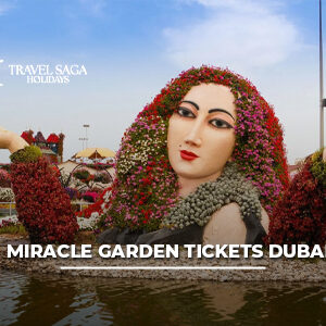 Visitors exploring colorful floral displays and flower sculptures at Dubai Miracle Garden.