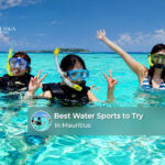 Tourists enjoying exciting water activities in the clear turquoise waters of Mauritius.